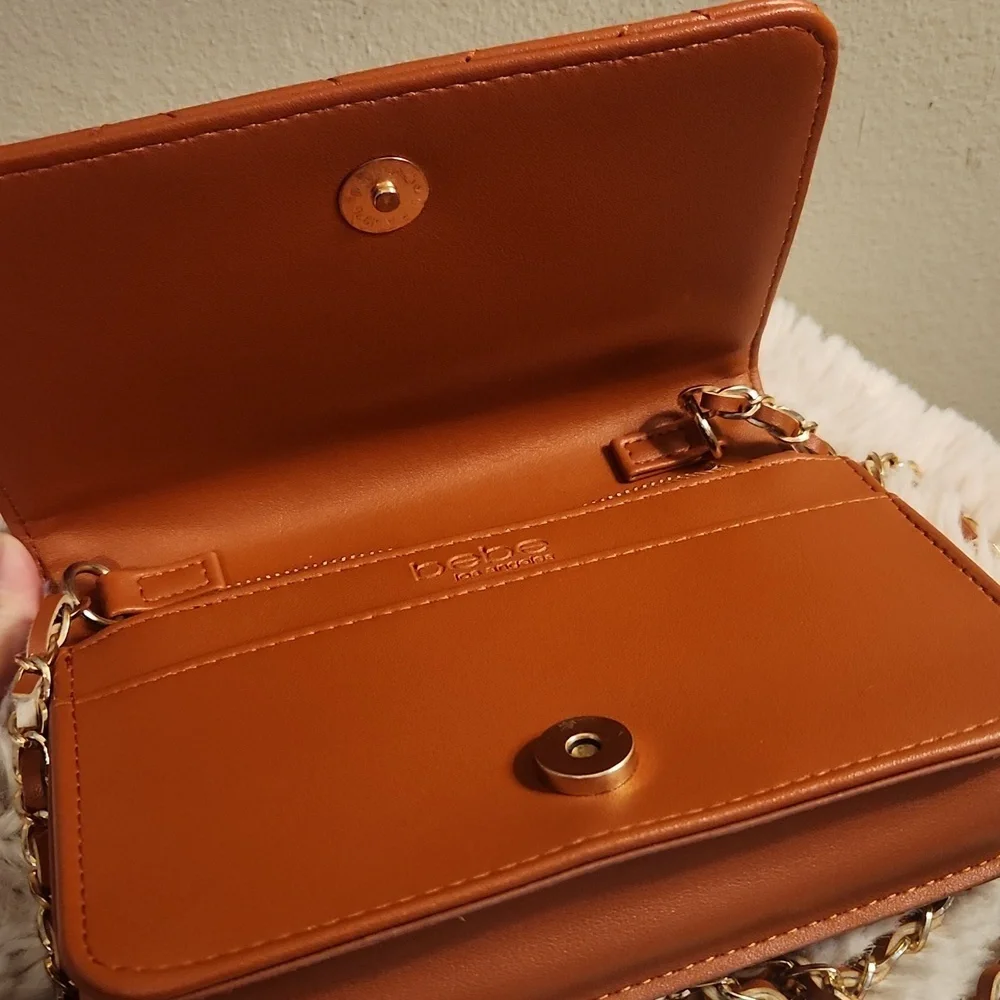 Bebe quilted bag with Gold rope chain cross body bag. Gently Used - Picture 9 of 16